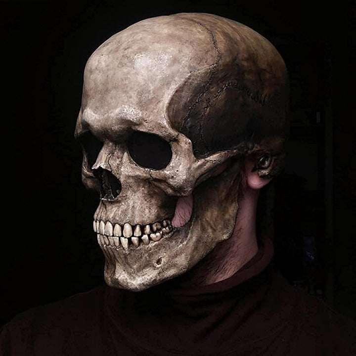 Weathered skull mask on a wearer in a black turtleneck, another view with closed jaw showing cracked suture lines and teeth.