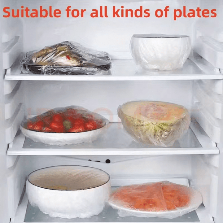 Another view of refrigerator shelves holding covered bowls, plates and a halved melon