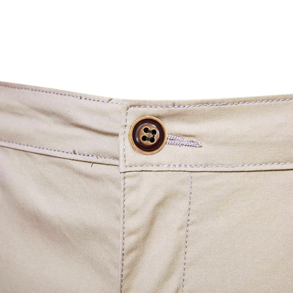 Close-up of the brown four-hole button, buttonhole and fly stitching at the waist 5