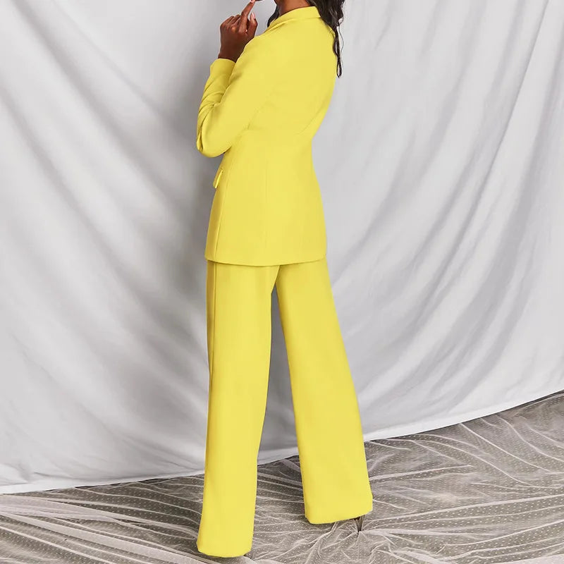Back and side view of the yellow suit, showing the fitted blazer and straight wide-leg pants 6