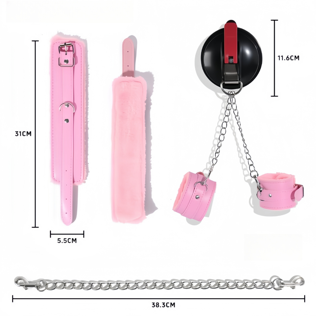 Dimension diagram of pink plush-lined buckle cuffs, shown with the suction mount, silver chains and measurements. 12