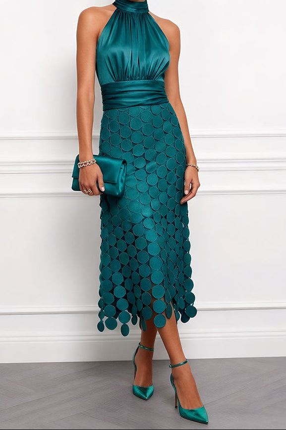 Halter Satin Midi Occasion Dress with Appliqué Skirt in deep teal green with a matching satin clutch and teal ankle-strap heels.