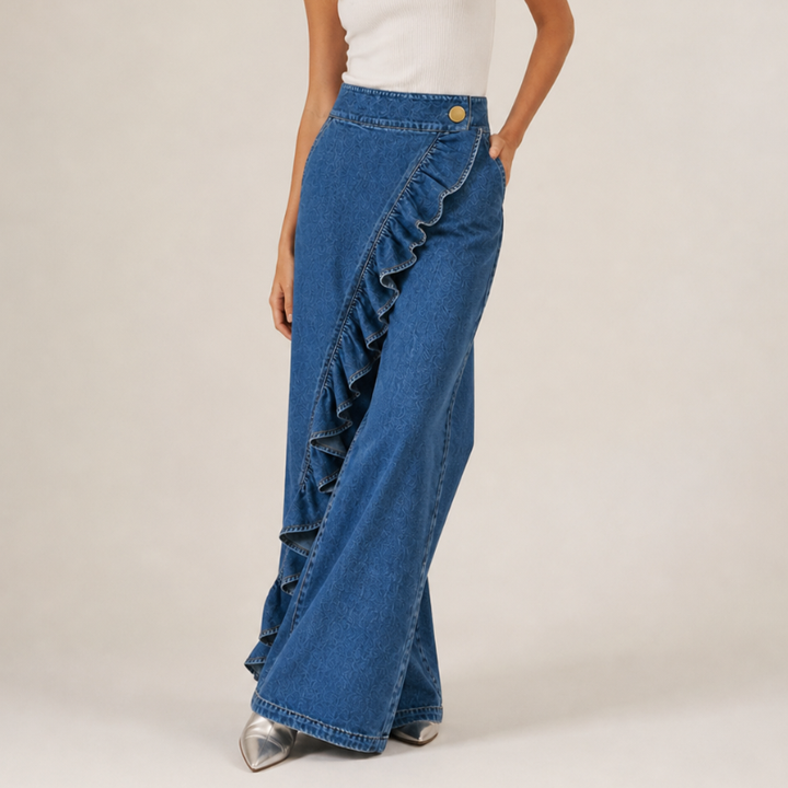 Mid-blue wide-leg denim pants with ruffle detail, front view.