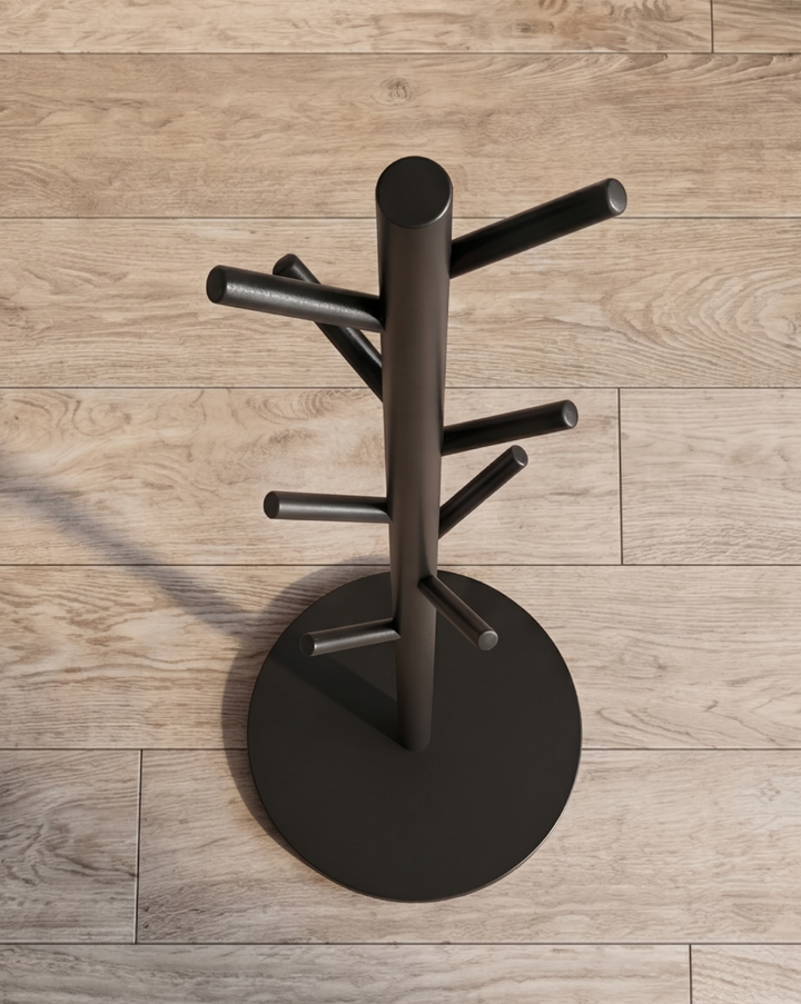 High-angle view of the black rack showing its round flat base and hooks spreading around the pole 6