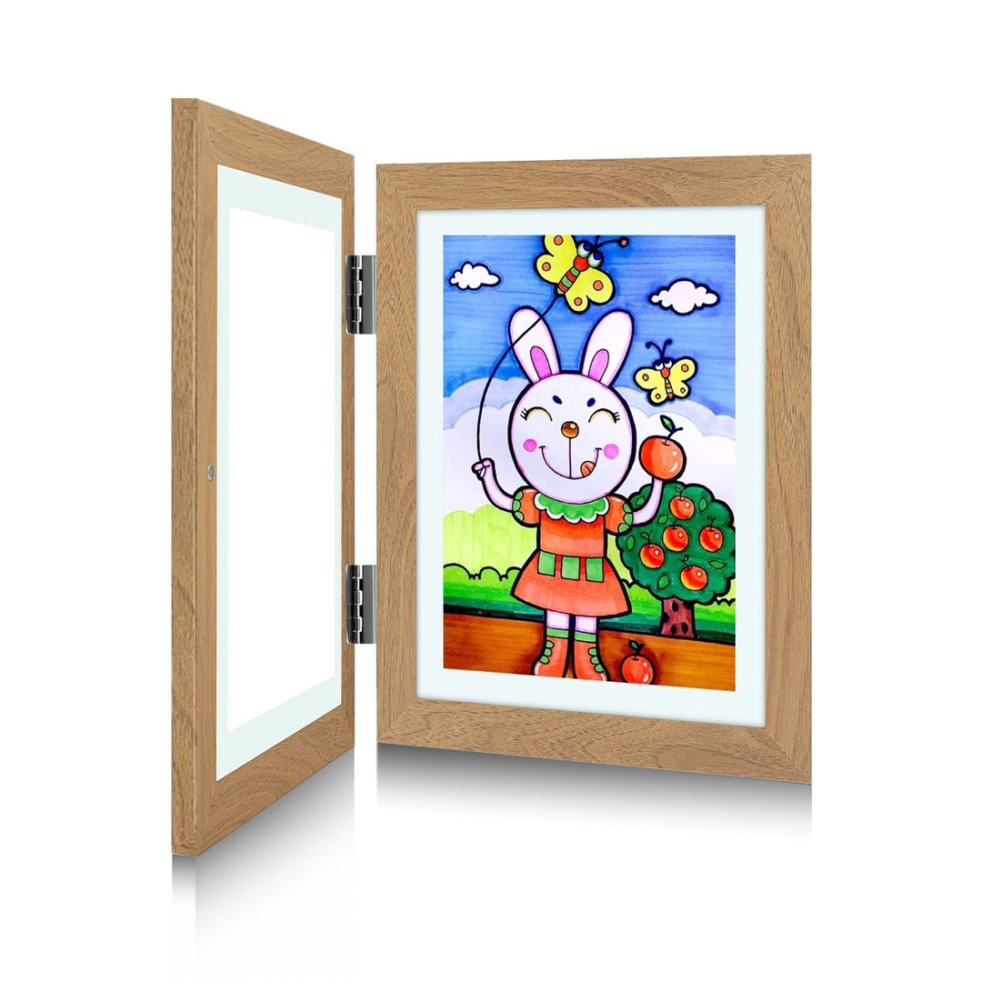 Wood-tone kids art frame another view, open with a bunny and butterflies drawing displayed on the right.