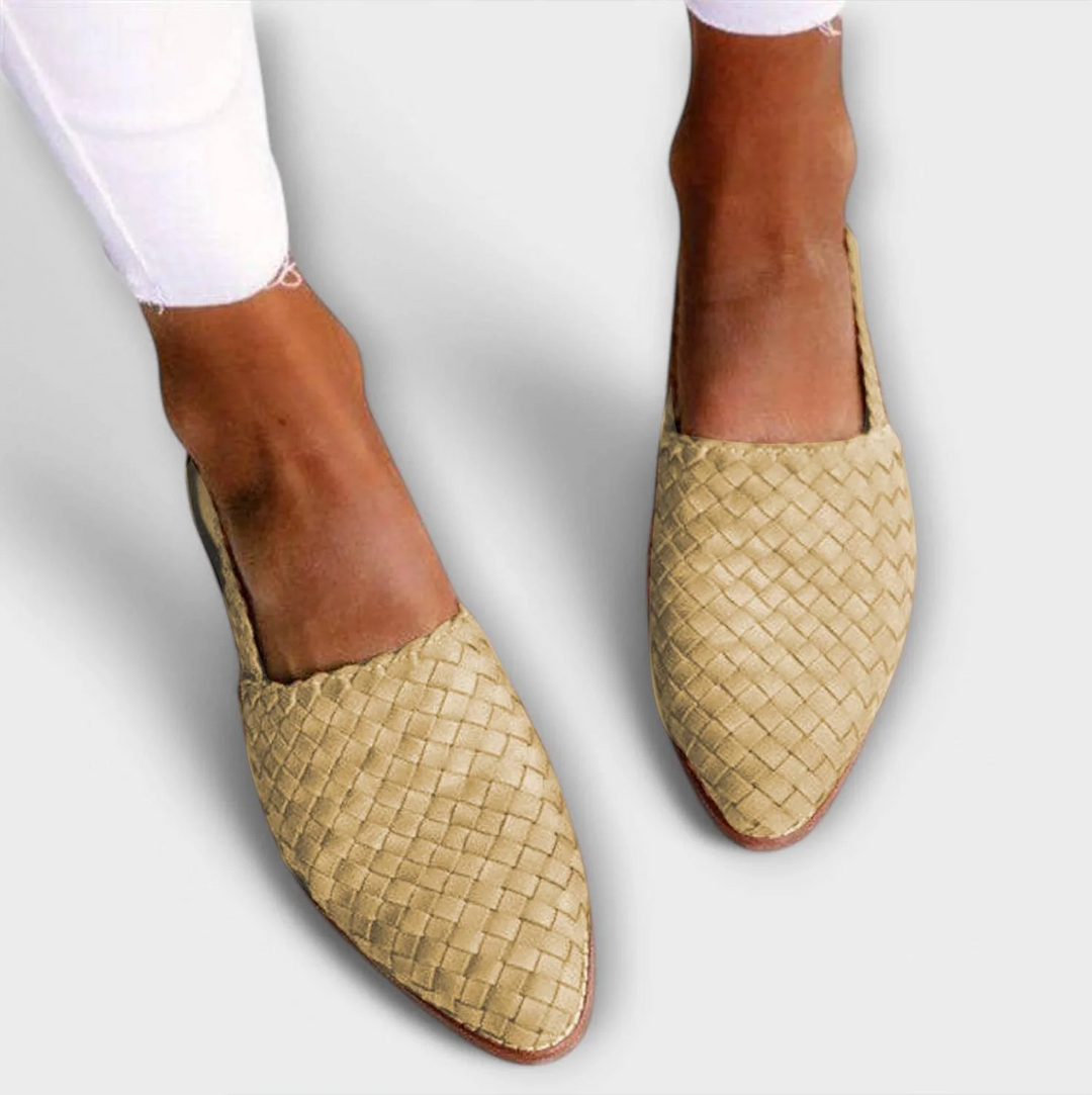 Light beige woven pointed-toe flats, another view.
