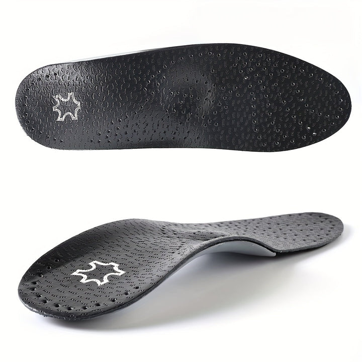 Pair of black perforated insoles from another view, showing the textured top surface and the curved arch profile.
