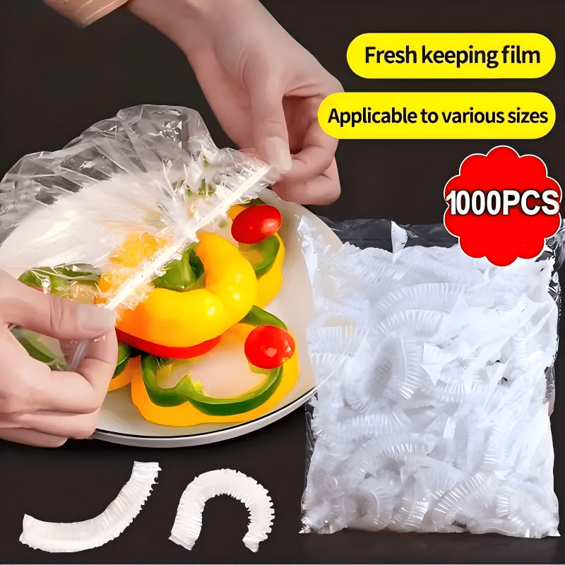 Another view of hands pulling a cover over a plate of sliced peppers and tomatoes