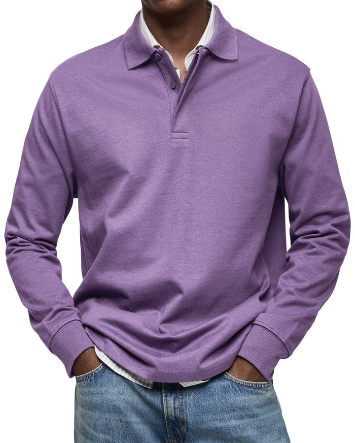 Man wearing the long sleeve polo shirt in lavender purple, another view.