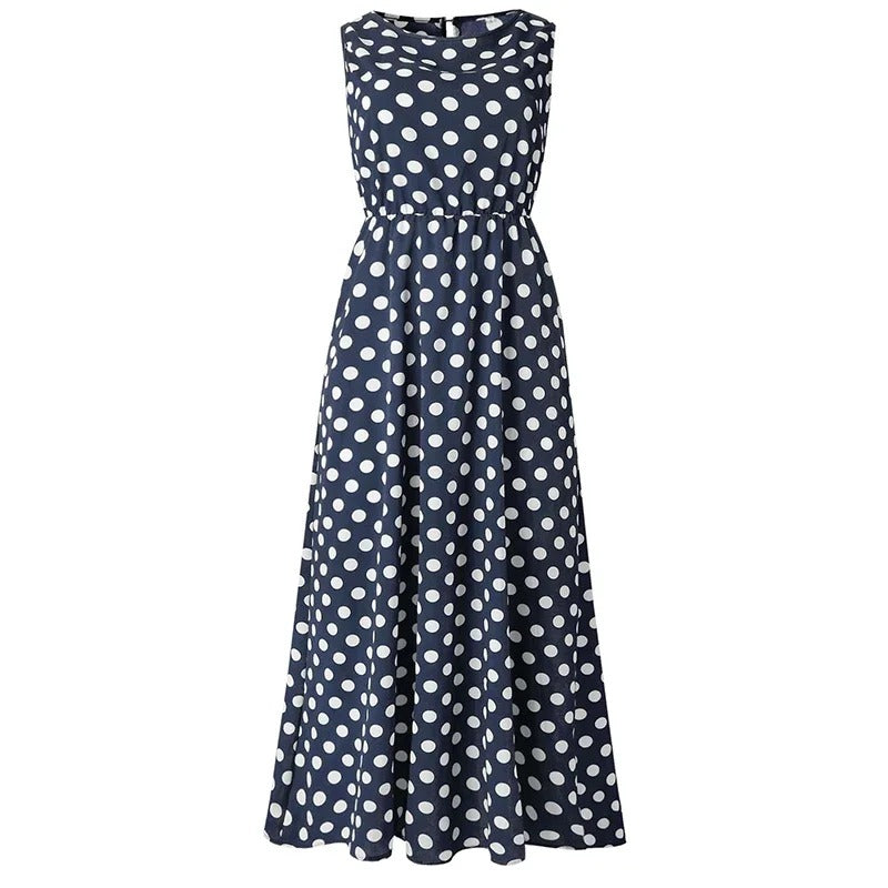 Navy blue sleeveless midi dress with white polka dots and an elastic waist, shown flat on white 6