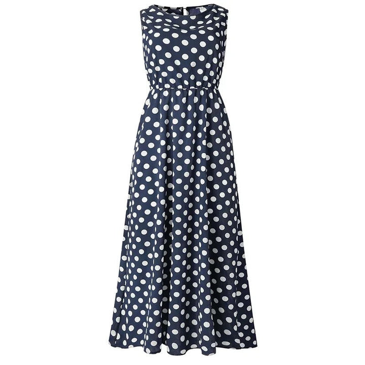 Navy blue sleeveless midi dress with white polka dots and an elastic waist, shown flat on white 6