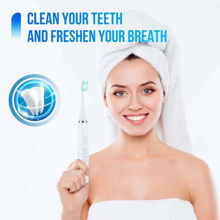 White electric toothbrush with a mint-green head beside a glowing tooth icon.