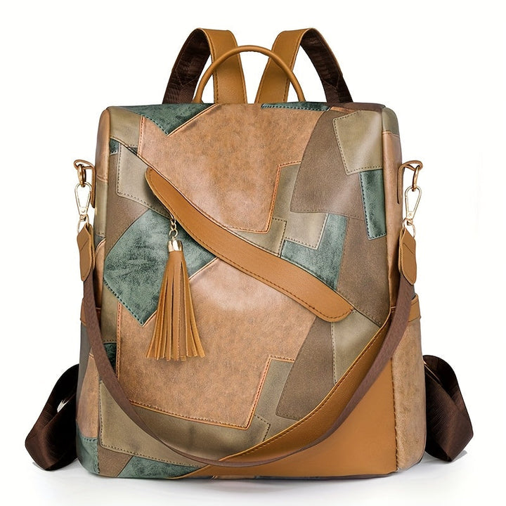 Brown patchwork backpack with green and tan panels, a leather tassel, gold clasps and a brown crossbody strap, shown from the front. 12