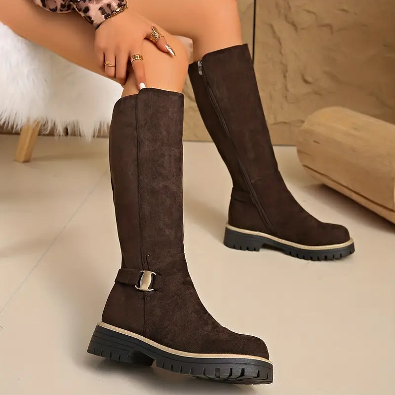 Dark brown tall boots another view, showing the buckle strap on one boot and the side zipper on the other.