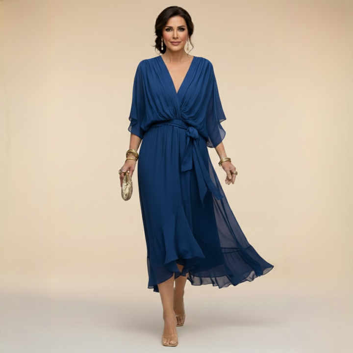 Royal blue midi dress another view with a tied sash at the waist.