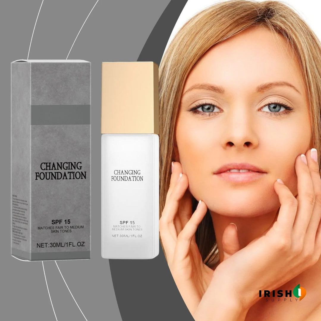 Gray carton and frosted bottle with gold cap next to a blonde model resting her hands on her face.