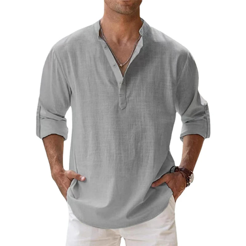 Men's linen Henley shirt in light gray with rolled sleeves and a button neck.