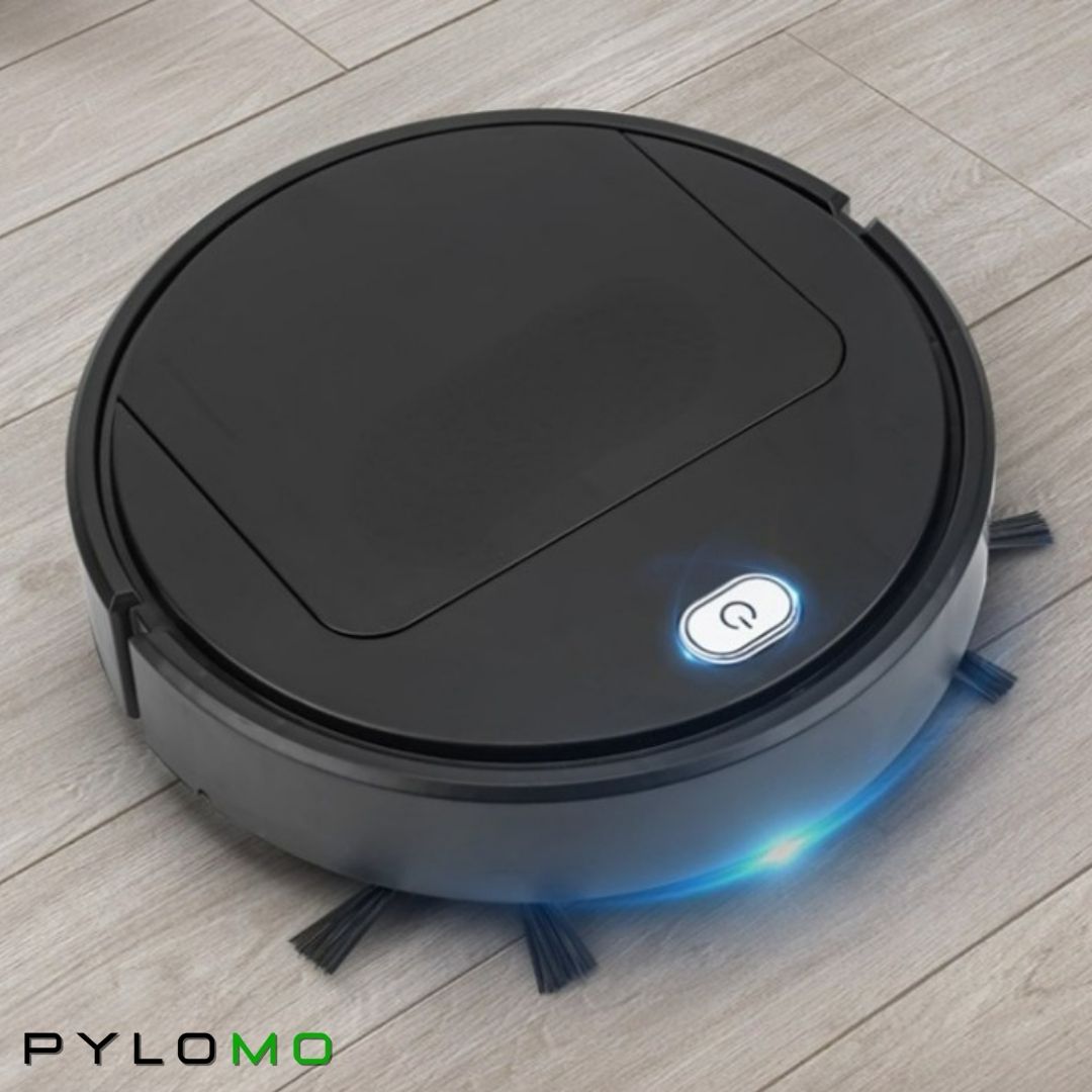 Black robot vacuum from above on a wood floor, with a lit power button and blue glow 4