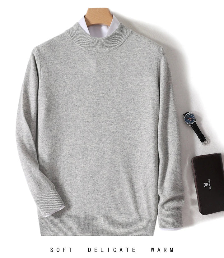Light gray knit sweater on a hanger over a white shirt, shown with a watch and wallet 7
