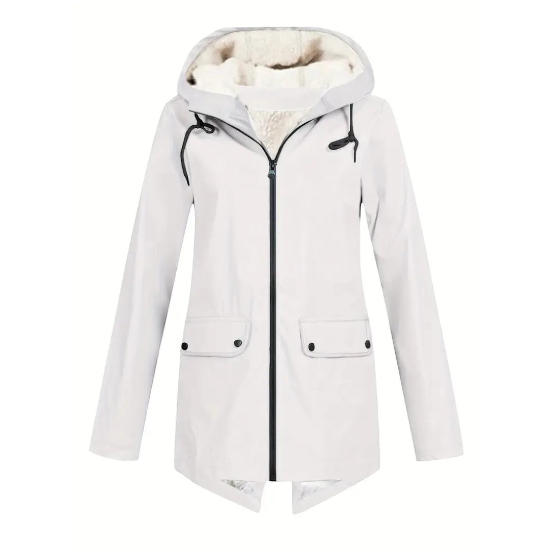 Flat lay detail of the white version of the jacket with fleece-lined hood, black zipper, drawstrings and snap flap pockets.