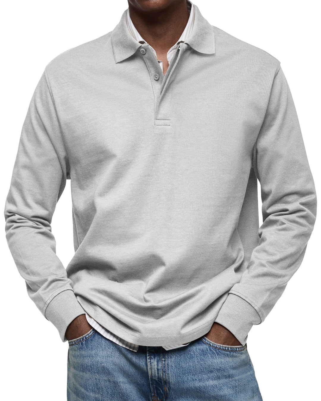 Man wearing the long sleeve polo shirt in light heather gray, another view.