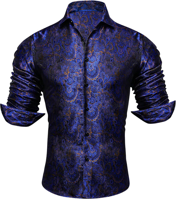 Shirt shown on a form without a model, navy blue paisley jacquard with gold accents, buttoned, sleeves folded up.
