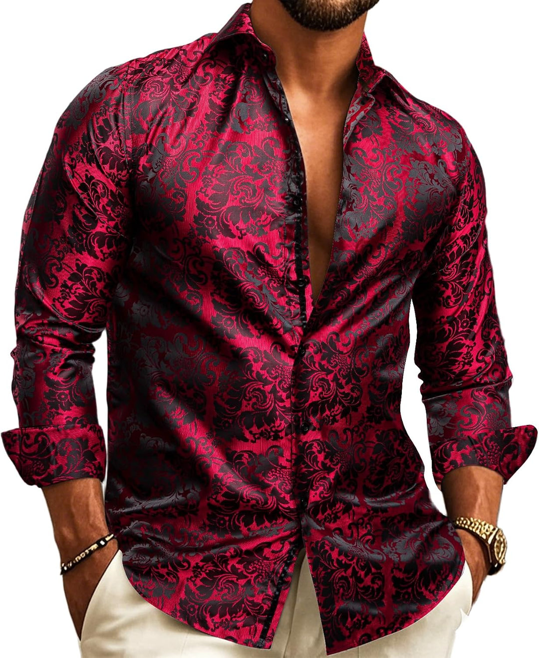 Close view of the shirt on a model, showing red and black damask-style jacquard with a ribbed sheen.