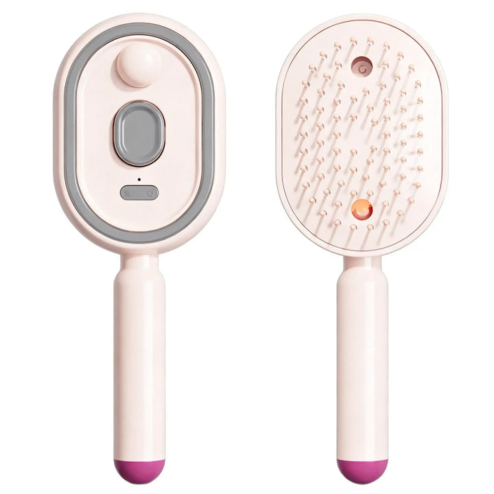 Pink comb shown from the front with buttons and from the back with bristles, mist outlet and orange light, with a magenta handle tip. 15