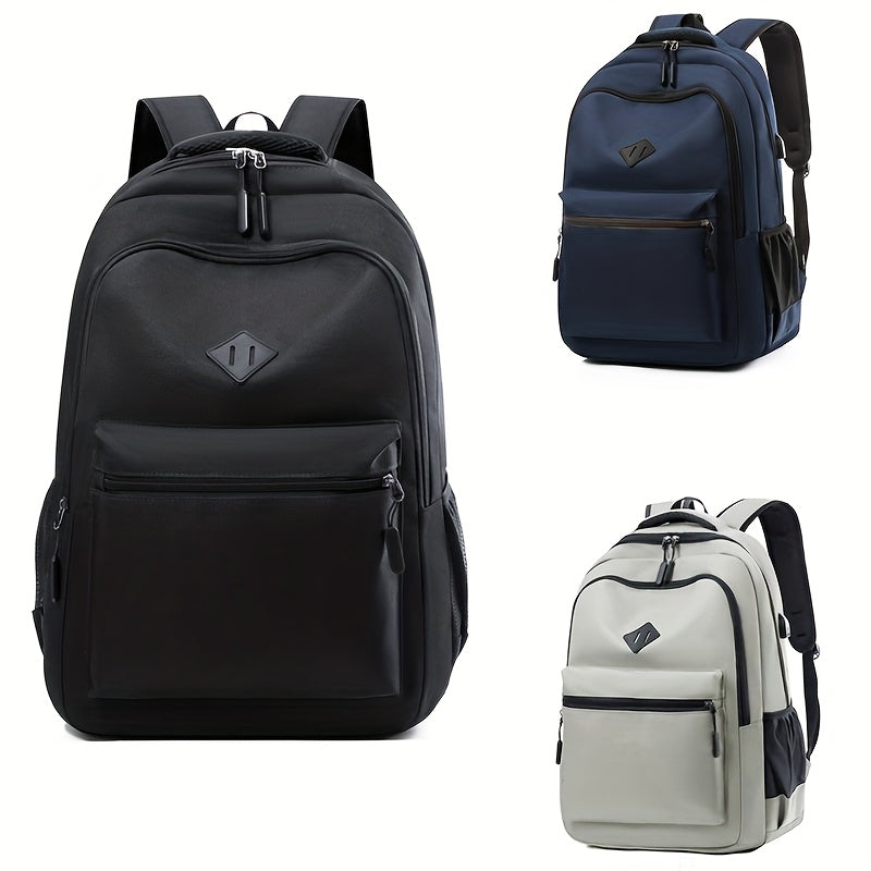 Three backpacks of the same design side by side: black large in front, navy blue upper right, light gray lower right.