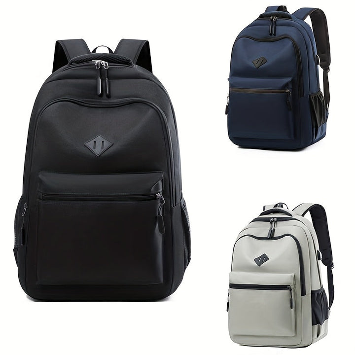 Three backpacks of the same design side by side: black large in front, navy blue upper right, light gray lower right.
