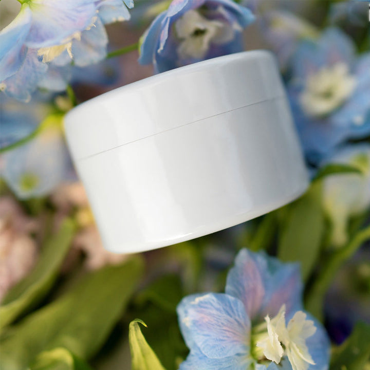 White round flower arranger vase insert with a visible seam