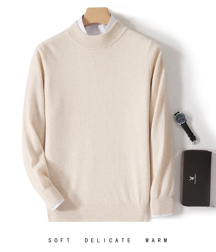 Beige knit sweater on a hanger over a white shirt, with a watch and wallet beside it 8
