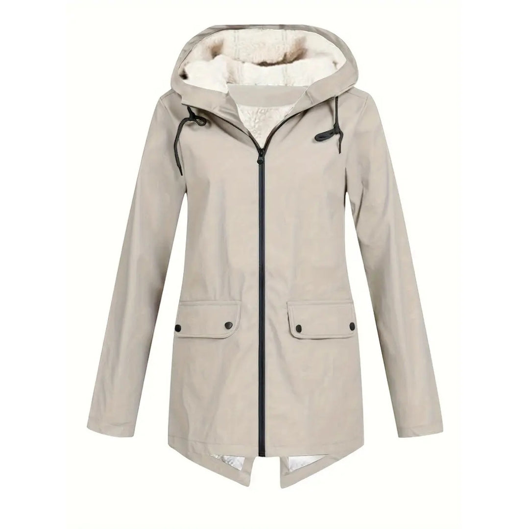 Flat lay detail of the light beige version of the jacket with fleece-lined hood, black zipper and snap flap pockets.