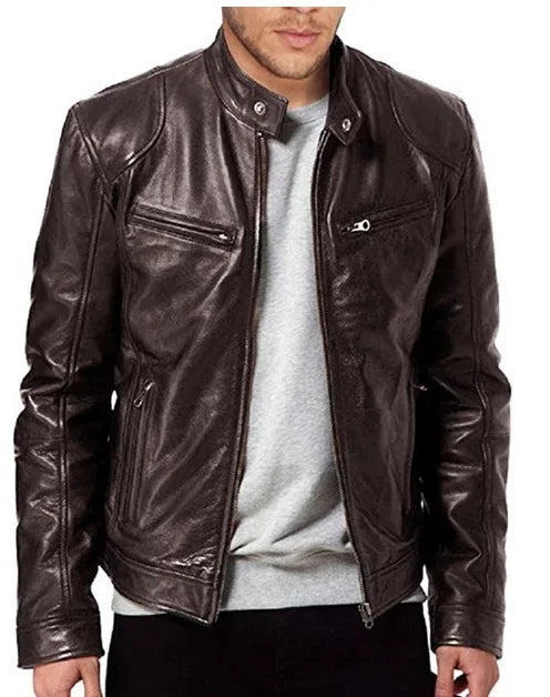 Model wearing a dark brown leather jacket unzipped over a gray sweatshirt, front view 8