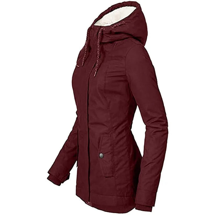 Side profile of a burgundy jacket with a drawstring hood, fleece lining and snap pocket flap 8