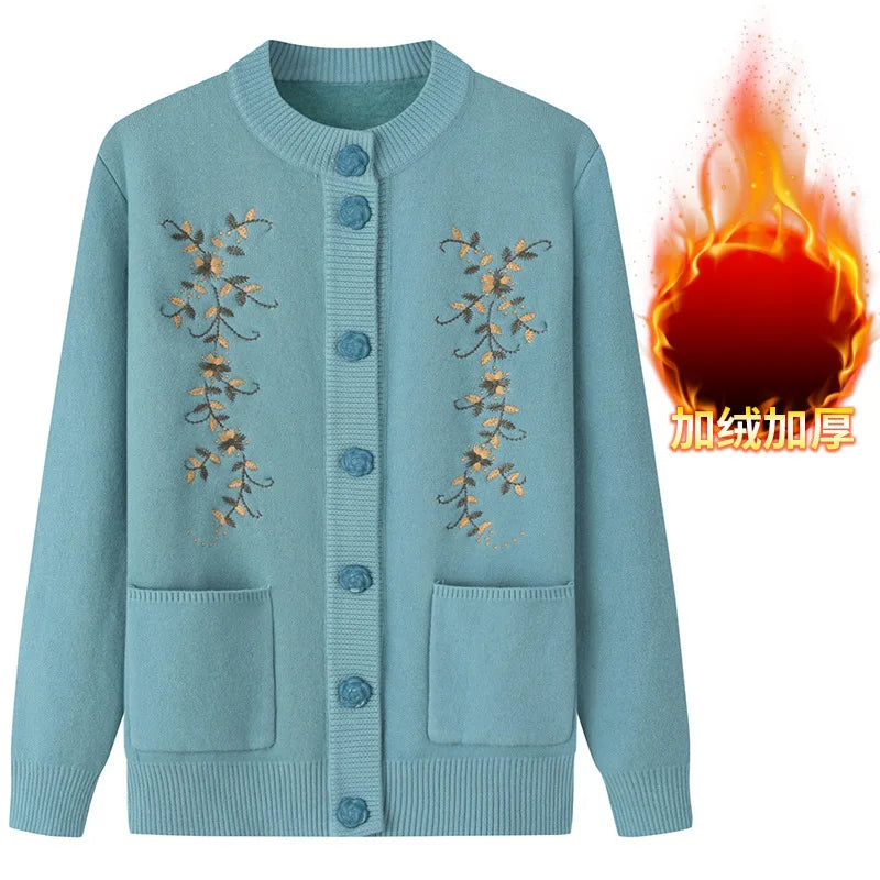 Blaue Strickjacke mit Blumenstickerei, Knöpfen und Taschen, Damenmode, warm, elegant.