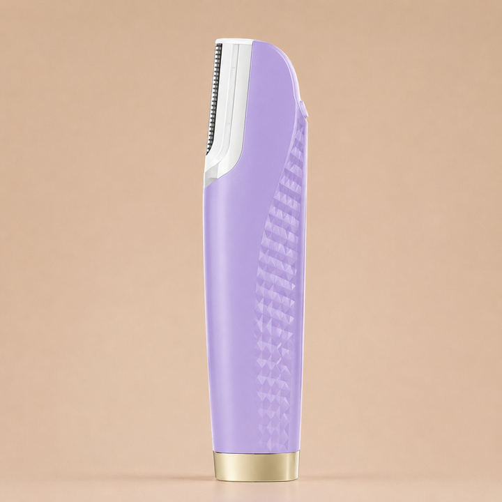 Lilac purple version of the hair remover standing upright, showing its diamond-patterned grip, white blade head and gold base.
