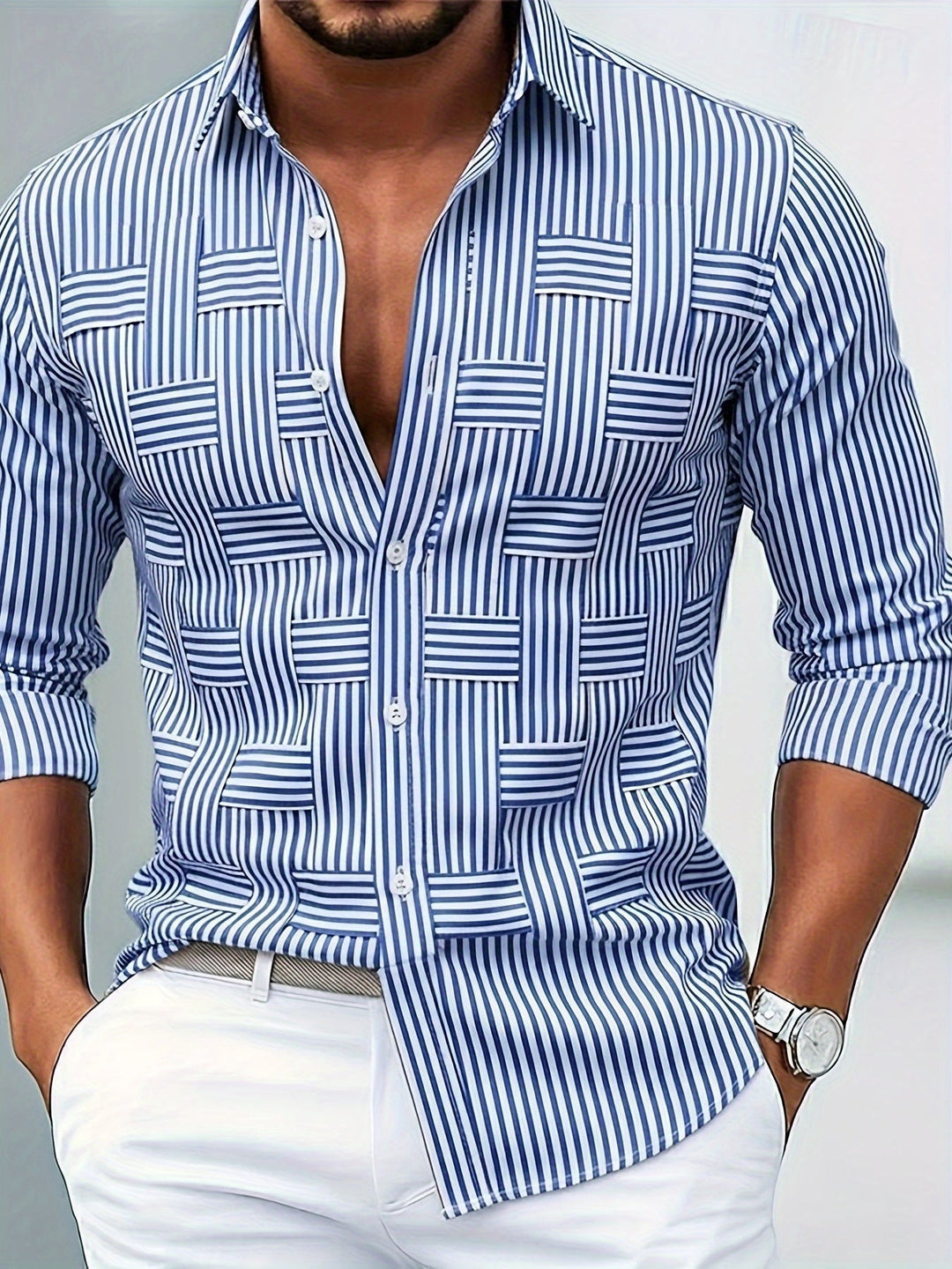 Blue and white striped button-up shirt with woven-look chest patches, front view on a model.