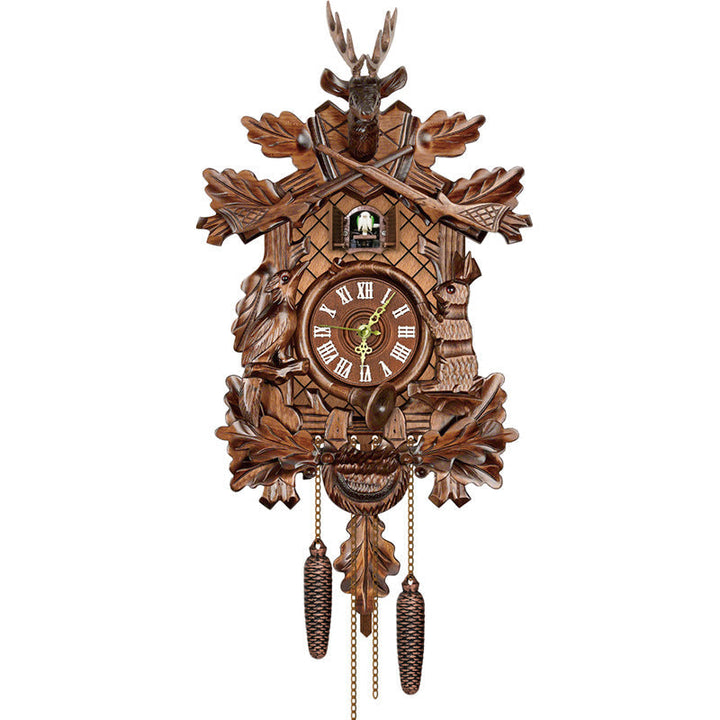 Carved hunting-style wooden clock with antlers, crossed rifles, oak leaves, animal carvings and Roman numeral dial 10