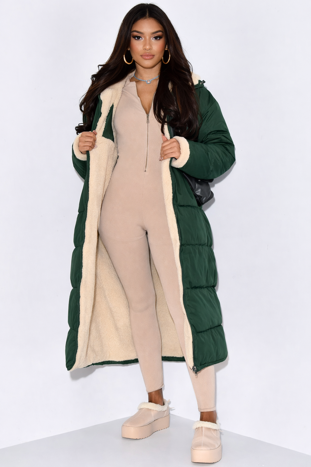 Women's reversible hooded long puffer coat, dark green side open with cream sherpa lining