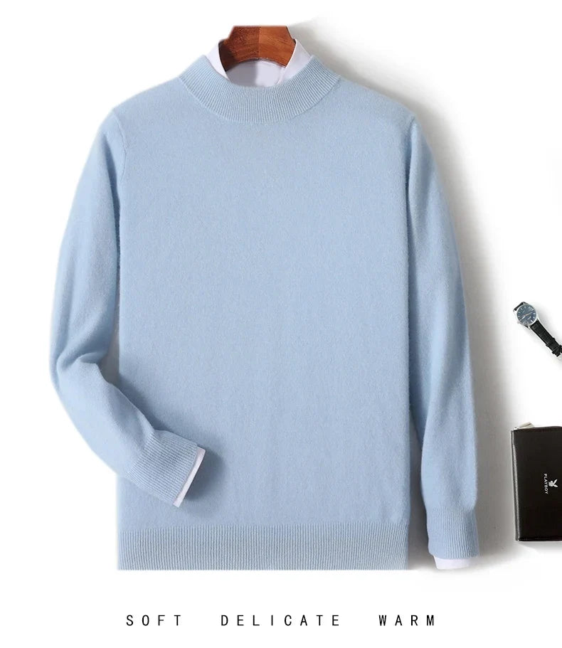 Pale sky blue knit sweater on a hanger with white shirt layered underneath, watch nearby 9