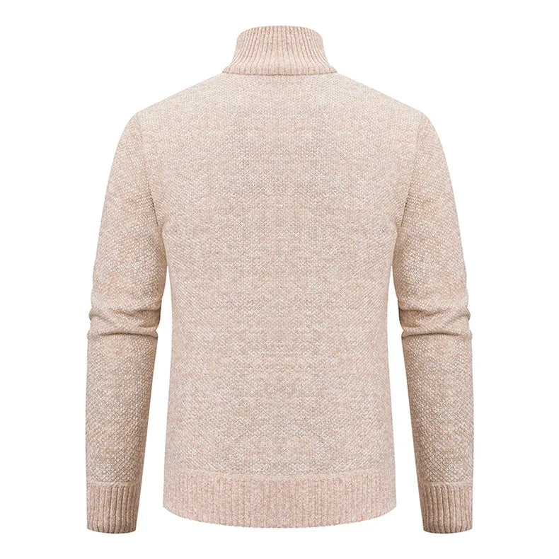 Back view of the beige knit cardigan showing the ribbed stand collar and hem 9