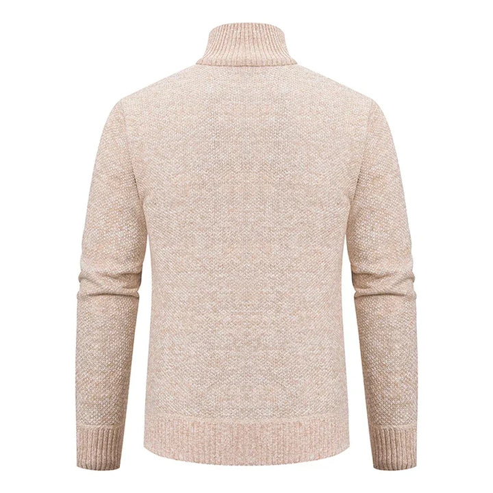 Back view of the beige knit cardigan showing the ribbed stand collar and hem 9