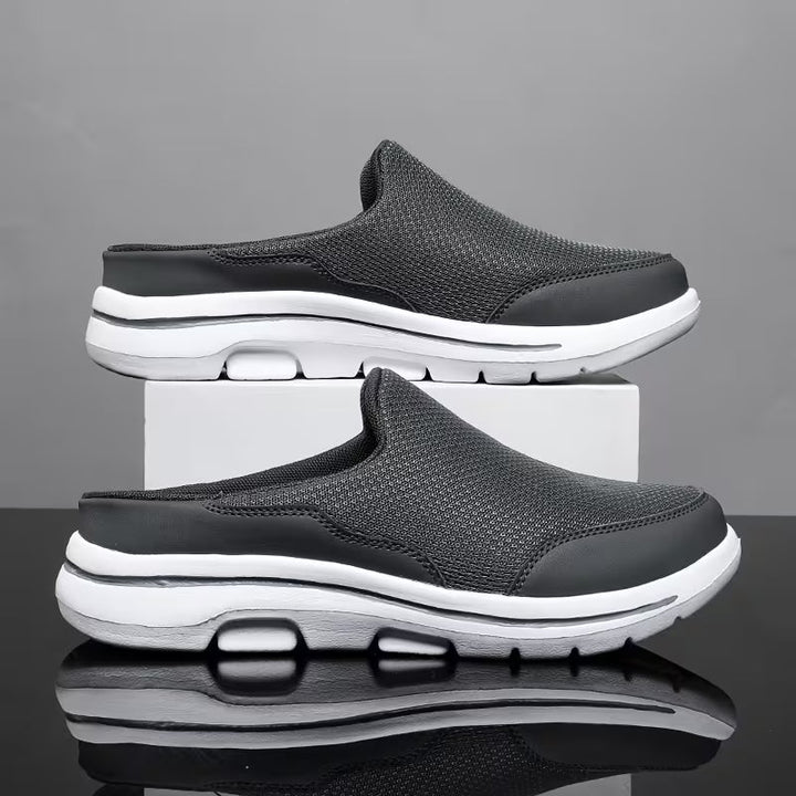 Orthofit 2.0 sport sandals in dark gray, pair shown with white cushioned soles.