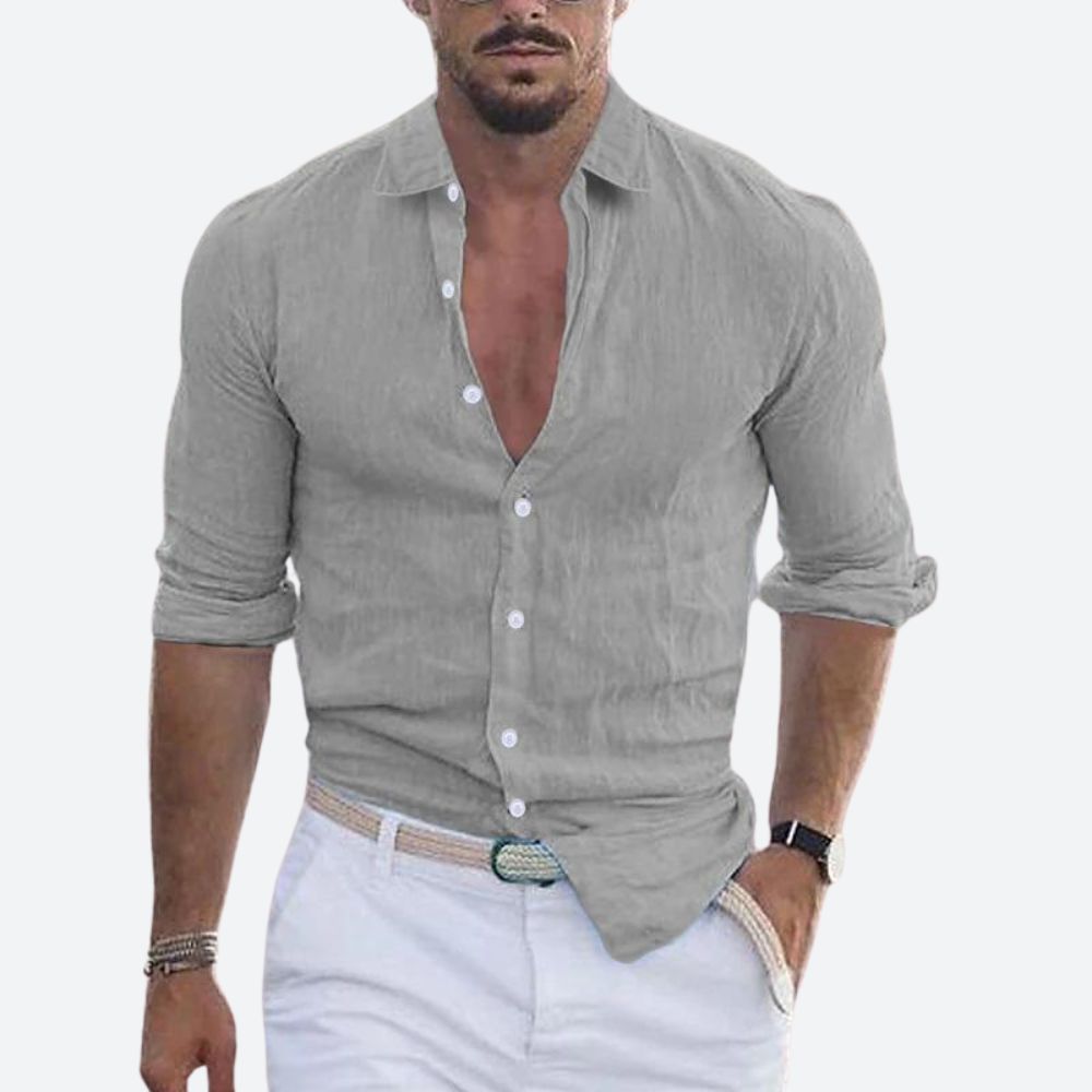 Men's linen shirt in light gray with an open collar and rolled sleeves.