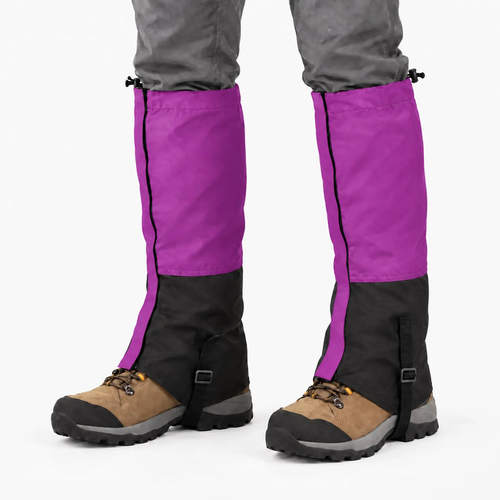 Purple and black gaiters worn over hiking boots on a white background, showing the drawcord top and boot strap. 8