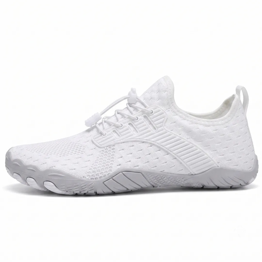 Side view of a white knit barefoot sneaker with a light gray sole, elastic toggle laces and a rear pull loop.