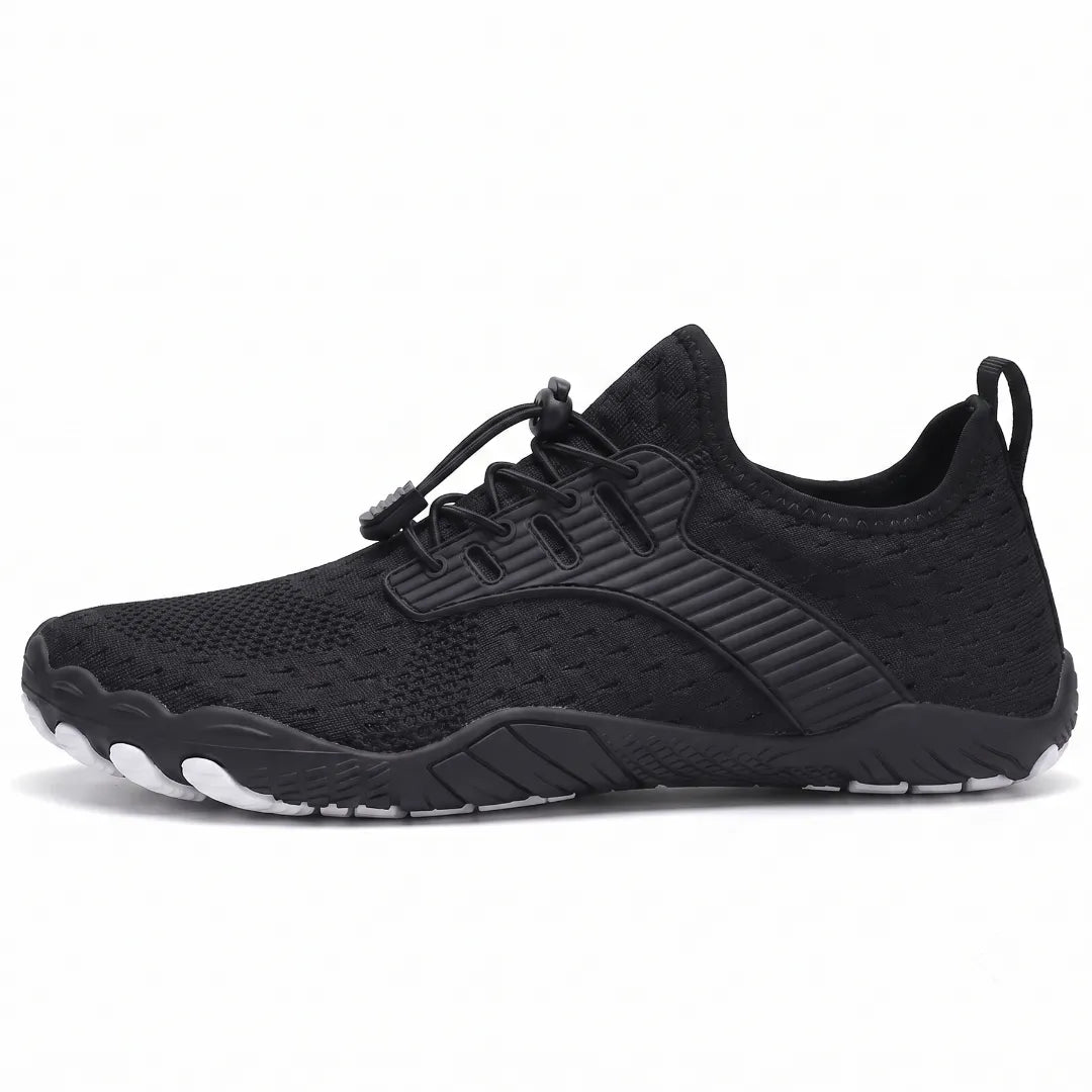Side view of a black knit sneaker with elastic laces, ribbed overlay, heel loop and white toe-shaped sole pods. 32