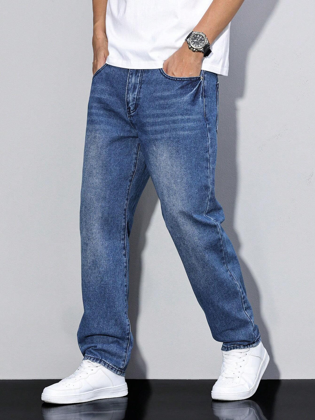 Gray washed baggy jeans, another view.