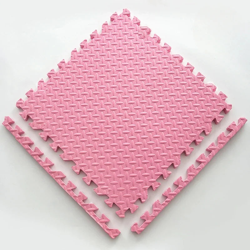 Single pink foam puzzle tile with a leaf-vein texture and two separate edge border strips.